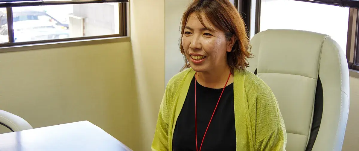 人事評価制度の構築の背景について語る赤山副社長