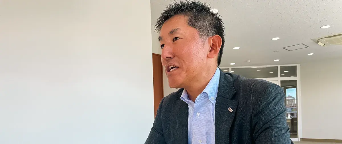 インタビューに答える山口様
